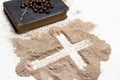 Old Bible, rosary and Cross of ash on white background - Ash Wednesday