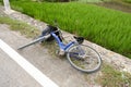 Bicycle accident fall on concrete road Royalty Free Stock Photo