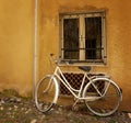 Old bicycle against wall Royalty Free Stock Photo