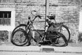 Old bicycle on a brick wall background. Copenhagen. Denmark.Black and white photo. Vehicle. Transport Royalty Free Stock Photo