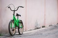 Old bicycle with concrete wall. Royalty Free Stock Photo