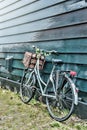 Old bicycle decorated with flowers Royalty Free Stock Photo