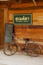 Old bicycle at the entrance to one of the hostels in Chiang Khan, Thailand.