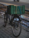Old Bicycle with Green Basket Parking at Thamel Street
