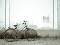 Old bicycle on grunge rustic cement Royalty Free Stock Photo