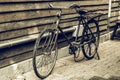 Old bicycle in invoice wood wall artwork Royalty Free Stock Photo