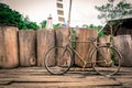 the old bicycle beside the old wall Royalty Free Stock Photo