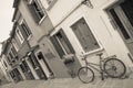 old bicycle parked long an external wall in Burano island, Venice (vintage effect) Royalty Free Stock Photo