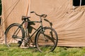Old Bicycle Parked Next To Large Soviet Military Canvas Khaki Tent Royalty Free Stock Photo