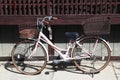 Old bicycle parked on the street