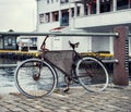 Old bicycle at pier in Bergen, Norway