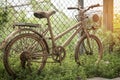 Old bicycle in public park vintage style Royalty Free Stock Photo