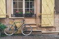 Old bicycle stands under the windows of the hotel in downtown Lviv