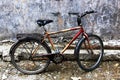 Old bicycle at the wall of an old house Royalty Free Stock Photo