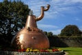 Old big copper kettle of a whiskey distillery