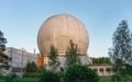 Old big dome of a radar antenna on the roof of the building of a Russian military base Royalty Free Stock Photo