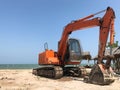 Old big excavator on the beach Royalty Free Stock Photo