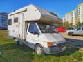 Old Ford camper van parked on grass