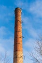 Old big red brick chimney in Talsi, Latvia Royalty Free Stock Photo