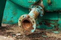 Old big old rusty automobile water tank with traces of rust. Abandoned waste rusty painted metal car tank, water barrel. Rusty Royalty Free Stock Photo