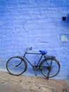 Old Bike on Blue Wall Royalty Free Stock Photo