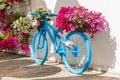 Old bike with floral decoration,Bodrum, Turkey.