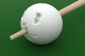 Old billiard ball punched cue. Royalty Free Stock Photo