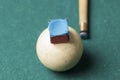 Old billiard white ball and stick on a green table. billiard balls isolated on a green background Royalty Free Stock Photo