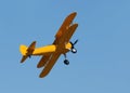 Old biplane in flight Royalty Free Stock Photo