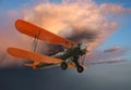 Old biplane in flight Royalty Free Stock Photo
