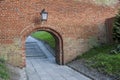 Old birck wall - entry to Cathedral, Frombork, Poland. Royalty Free Stock Photo