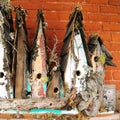 Old birdhouses in a row Royalty Free Stock Photo