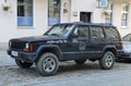 Old 4WD car Jeep Cheerokee forst model parked Royalty Free Stock Photo