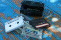 Black audio player with a cassette is lying on a worn blue table Royalty Free Stock Photo