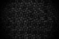 Old black bamboo weave texture background, pattern of woven rattan mat in vintage style Royalty Free Stock Photo