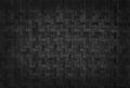 Old black bamboo weave texture background, pattern of woven rattan mat in vintage style Royalty Free Stock Photo