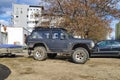 Old black big Nissan Patrol with long exhaustion pipe parked. Royalty Free Stock Photo