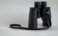 old black binoculars on a white background Royalty Free Stock Photo