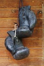 Old black boxing gloves Royalty Free Stock Photo
