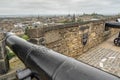 Old black cannon on a castle wall Royalty Free Stock Photo