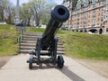 Old black cannon on wheels in Quebec, Canada