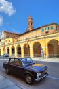 Old black car on the street in Bra, Italy. Royalty Free Stock Photo