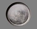 Old black cast iron Frying pan isolated on grey background top view close-up. Royalty Free Stock Photo