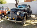 Old black 1940 Chevrolet Chevy Master 85 business coupe in a park. AAA 2022 classic car show Royalty Free Stock Photo