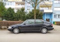 Old black classic Swedish car Saab 900 parked