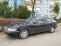 Old black classic Swedish car Saab 900 parked