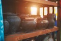 Old black clay pots on a shelf Royalty Free Stock Photo