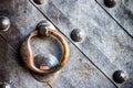 Old black door with ring knocker Royalty Free Stock Photo