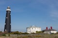 Old black Dungeness Lighthouse