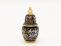 Old black golden perfume flask with paintings
